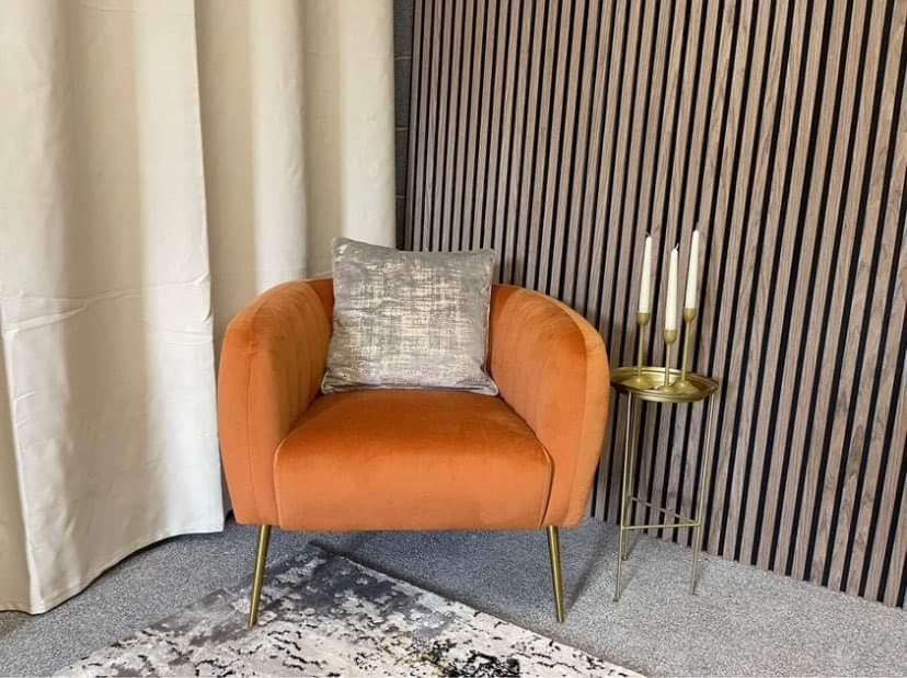 Orange velvet armchair