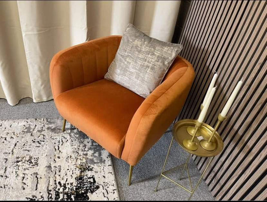 Orange velvet armchair